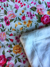 Load image into Gallery viewer, Dolls minky blanket cottn front synthetic minky back pink floral close up of fabric showing folded minky corner