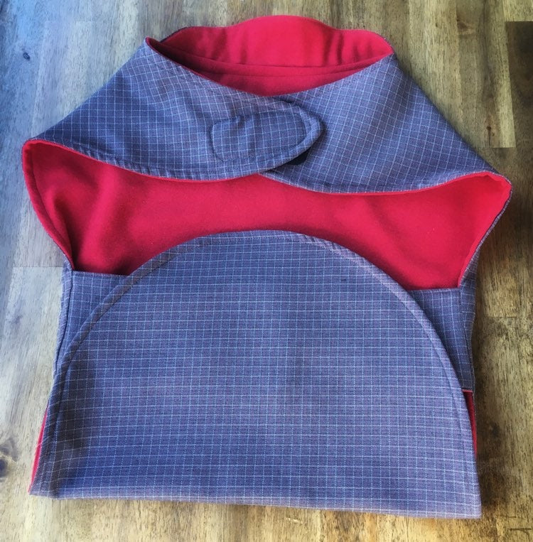 wool blend dog coat; grey check outer with red wool flannel lining, available in 5 sizes to suit all dogs, flat lay photo showing fabric and collar feature