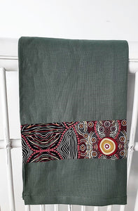 Linen tea towel, indigenous design tea towel, Australian Aboriginal artist, Kokos String by Audrey Martin Napanangka on green linen