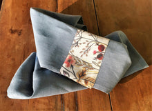 Load image into Gallery viewer, blue linen tea towel with warm autumn coloured trim. Linen is super absorbent and improves with age. Handmade with all Australian Attitude. Made in Australia from European linen. Generous size.