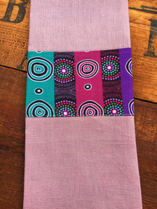 Linen tea towel, indigenous design tea towel, Australian Aboriginal artist, Desert Flowers by Marie E, Ellis on dusty pink linen