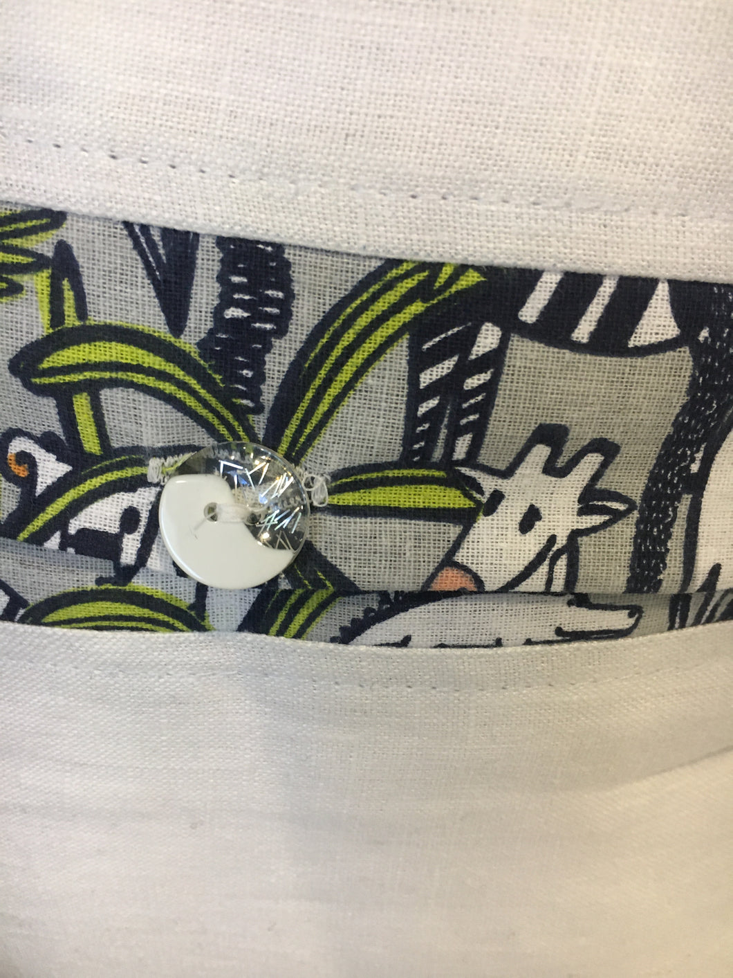 Jungle theme nursery cushion covers in linen. Navy blue and lime colour. Tigers, elephants, crocodiles, giraffes, safari