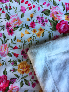 Dolls minky blanket cottn front synthetic minky back pink floral close up of fabric showing folded minky corner
