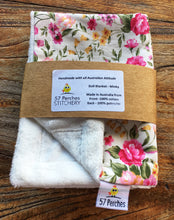 Load image into Gallery viewer, Dolls minky blanket cottn front synthetic minky back pink floral folded and packed showing labels