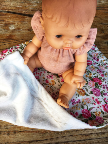 Dolls minky blanket cottn front synthetic minky back pink floral doll sitting on blanket
